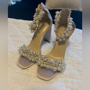 Size 8, pearl heels that are satin baby pink